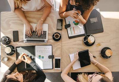 Top view of four people in a meeting