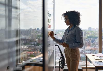 woman in a corporate office planning