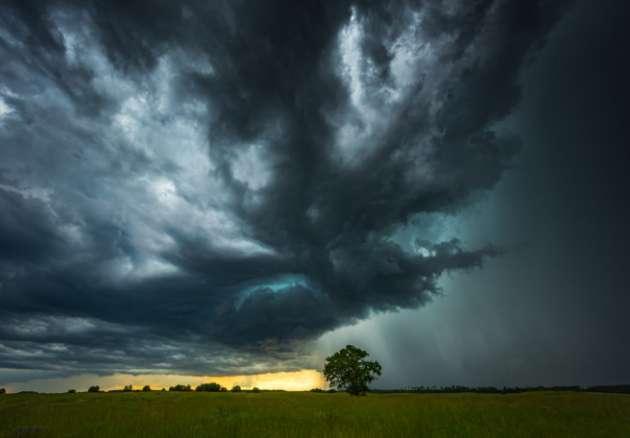 Ominous sky with storm clouds over a field